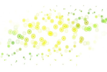 Light Green, Yellow vector background with bubbles.