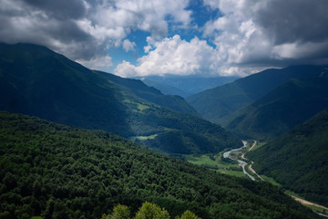 Naklejka na ściany i meble Dramatic mountain landscape, the Caucasus. Summer in the mountains