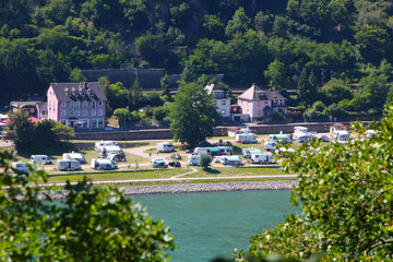 Fototapeta na wymiar Campsite at the river Rhine with view at Loreley rock (St. Goar, Germany)