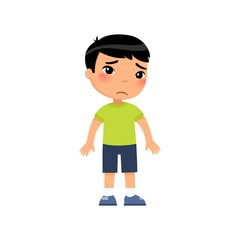 Sadness little asian boy flat vector illustration. Upset child standing alone cartoon character. Lonely kid in bad mood, person unhappy expression isolated on white background