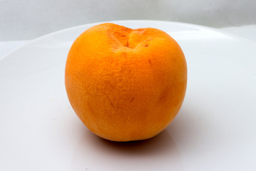 An appetizing and tasty peach.