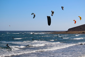 Kitesurfers in El Medano at the Atlantic Ocean (Tenerife, Spain)