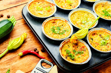 Freshly baked muffins with zucchini