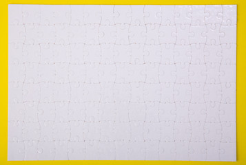 White jigsaw puzzle pattern background