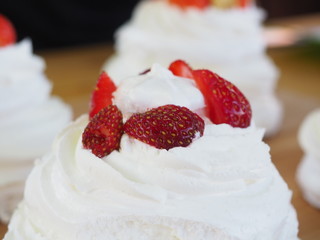 the chef decorates the dessert with fresh raspberries and strawberries. Anna Pavlovna's dessert