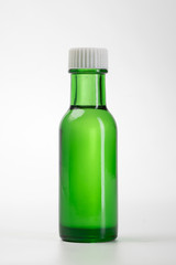 essential oil bottle. Mock up bottle cosmetic or medical vial, flask real photo