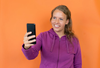 Video call of blond german young adult woman with hoody