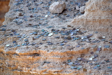 Thrown Coins inside the Rock of Cape Kaliakra Bulgaria