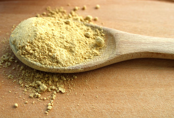 wooden spoon with ginger spice