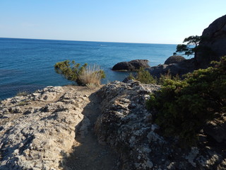 rocks by the sea, sunny
