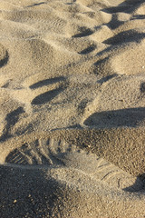 Fototapeta na wymiar close-up footprint on the sand