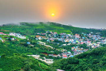 Fototapeta premium The dawn in a small village in the valley is beautiful near Da Lat, Vietnam