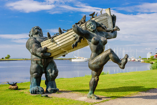 Kuressaare city, Saaremaa island, Estonia - July 12, 2018: Sightseeing of Saaremaa island. Statues of folk Estonian characters Suur Toll and Pirate in Kuressaare.