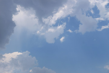 White clouds against blue sky background