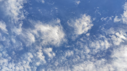 Blue sky background with clouds. Nature background.