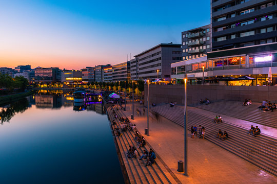 Saarbr&uuml;cken at night with bridge and river