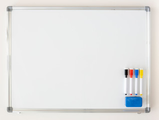 White board mockup with colored markers. Copy space for business schemes and charts