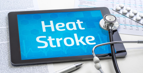 The word Heat Stroke on the display of a tablet