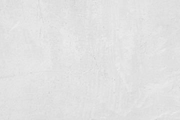 Naklejka premium White wall of the building. Rough plaster surface. Abstract background.