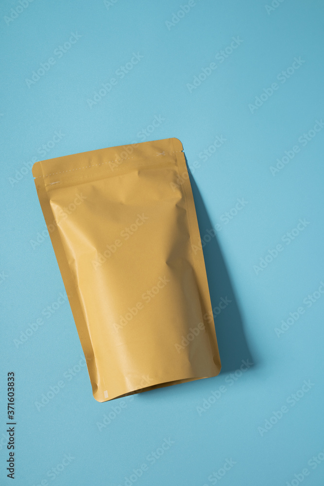 Sticker blank standing pouch mockup over blue background