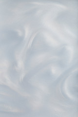 Soft shimmering texture imitation pearls.