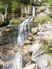 Waterfall flowing over rock face