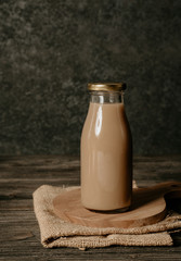 close up of coffee on a glass bottle product mockup