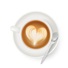 Cappuccino with froth, decorated with heart of milk, in white cup and saucer.