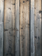 Drewno wyblakłe deski stare tło tekstura. Wiejska chata ściana z desek Retro Rustykalny wiejski styl. 