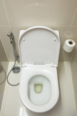 Toilet in the bathroom. ceramic toilet bowl indoors, top view .toilet bowl in bathroom.
