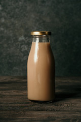 close up of coffee on a glass bottle product mockup