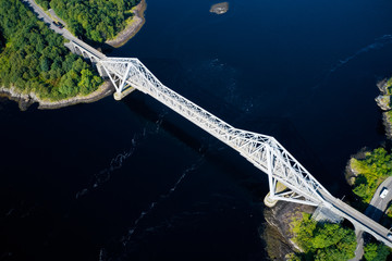 Fototapeta premium Connel Bridge steel cantilever structure ocean sea road crossing over Loch Etive in Argyll and Bute Scotland