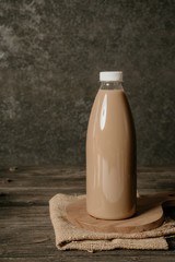 real photo mockup of coffee product on plastic bottle