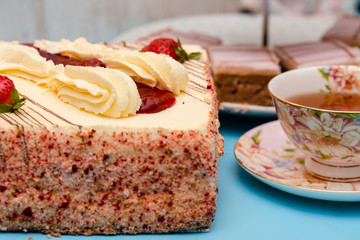 Strawberry gateau and a cup of tea