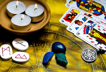 esoteric, fortune teller and magic tools candles, runes, gem stones, astrology and zodiac, horoscope, amulet and talisman, 