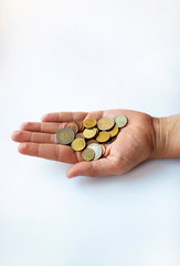 some small coins on the hand