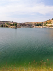 a picturesque lake in an abandoned quarry