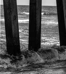black and white water under the pier