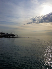 breakwater going out to sea in sunset