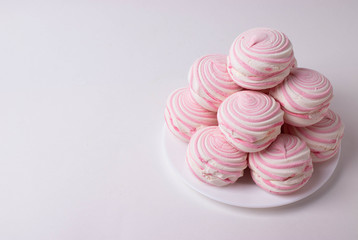 many pink round sweet marshmellows