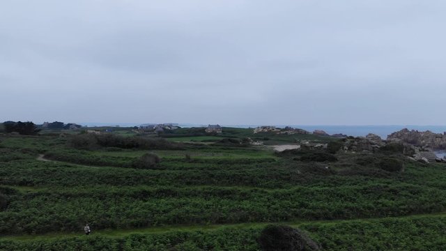 touristic aerial drone shot of Brehat island is an island and commune located near Paimpol, a mile off the northern coast of Brittany. Administratively, it is a commune in the C&ocirc;tes-d'Armor department