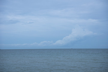 Seascape with sea horizon and almost clear deep blue sky - Background