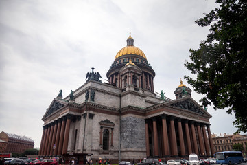 Fototapeta na wymiar St Isaac Cathedral in cloudy weather day. Museums Isaac's Square. Unique urban landscape center Saint Petersburg. Central historical sights city. Top tourist places in Russia. Capital Russian Empire