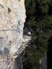 a rope on the rock for climbing