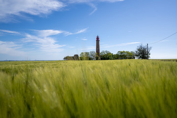 The Summer on the island of Fehmarn. Bike Tour to the Lighthouse Flügge, a local landmark at the...