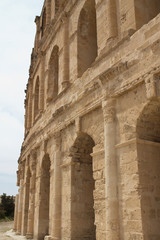 Naklejka premium El Djem Tunisia, roman amphitheatre external facade and arches