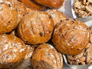 Closeup of currant raisins bread buns on dutch market