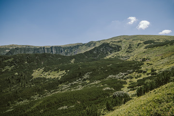 A sign on the side of a mountain