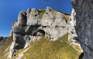 a rope on the rock for climbing