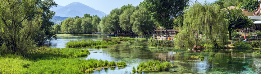 summer wide landscape of Posta Fibreno lake,nature reserve in the Italian national park of Abruzzo,Lazio and Molise - obrazy, fototapety, plakaty